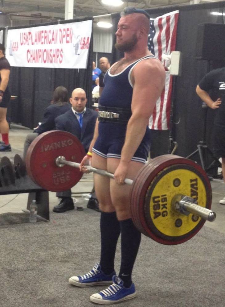 The author deadlifting 563 pounds in December 2014–his best deadlift to date when the train was rolling full steam ahead.